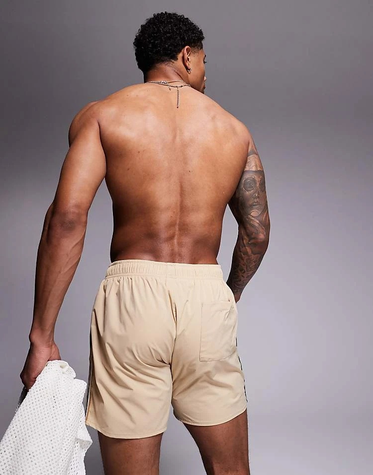 BOSS Bodywear BOSS Iconic Side Stripe Logo Swim Shorts In Light Beige For Men - Image 4